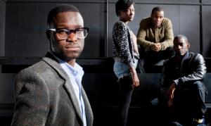 Femi Oguns (left), the founder and CEO of the Identity Drama School in Hackney with three of his students. Photograph: David Levene/The Guardian