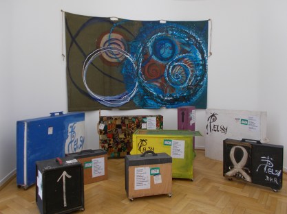 Packing crates and tarpaulin painted by El Hadji Sy.