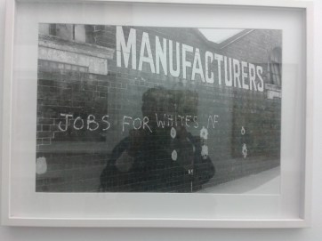 Street photography by Vanley Burke showing racist graffiti.