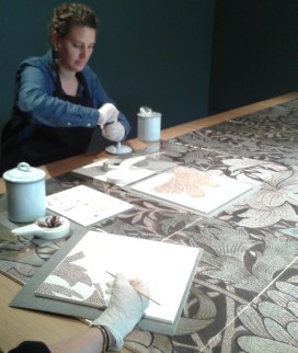 Two women artists volunteering as "apprentices" to support the completion of Twomey's installation (NB: volunteers' names were not disclosed). Photo: Carol Dixon